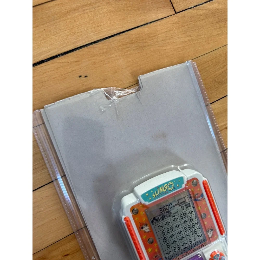 Vintage 1998 SLINGO Tiger Handheld Electronic LCD GAME  Slots Bingo Factory Seal